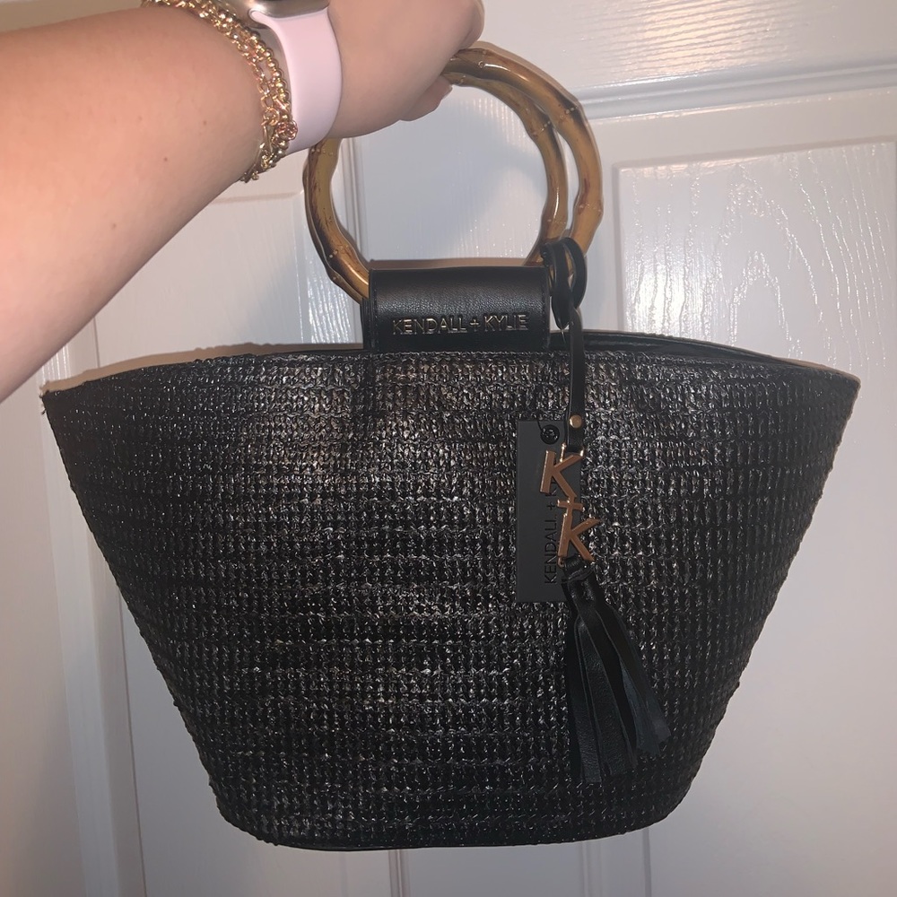 Kendall & Kylie Raffia Straw Drawstring Tote (black).